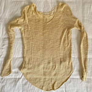 Helmut Lang silk sweater with shred detail.